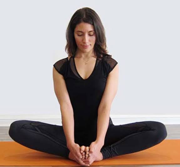 pregnant woman is engaged in yoga. Reclined Bound Angle Pose or Supta  Baddha Konasana Stock Photo | Adobe Stock